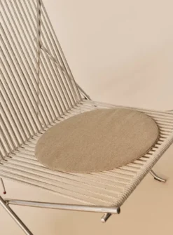 PK4 Loungestol i natur, stålstel af Poul Kjærholm