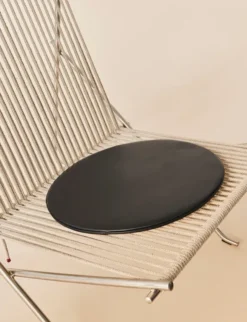 PK4 Loungestol i sort, stålstel af Poul Kjærholm