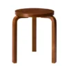 Stool 60, walnut stained fra Artek